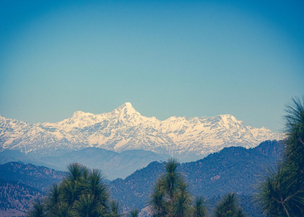 Snow-covered Himalayan peaks visible from Kumaon hills Uttarakhand
